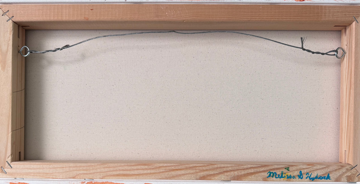 The back side of a canvas showing the light wood frame, beige linen canvas, hanging wire with metal rings, and a blue artist signature in the bottom right corner that reads "Melissa G Hydock"