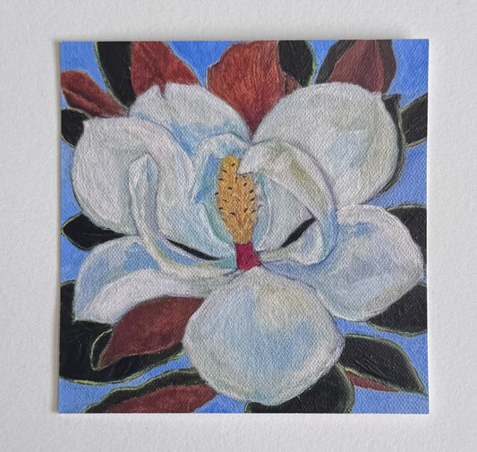4in x 4in art print without borders of an open magnolia flower with surrounding brown and green leaves